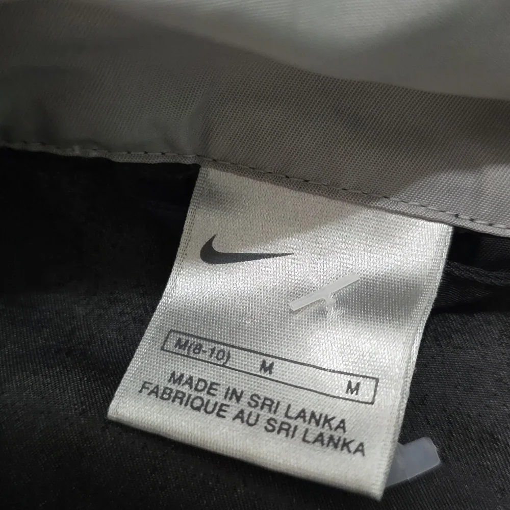 Nike Nylon Jacket Shell Black Zip Front & Zip cuffs. Covered placket